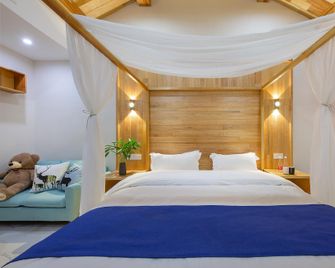 Ting Jianmusu Private Soup Design Homestay (South Gate Of Wuzhen Xizha Scenic Area) - Jiaxing - Bedroom