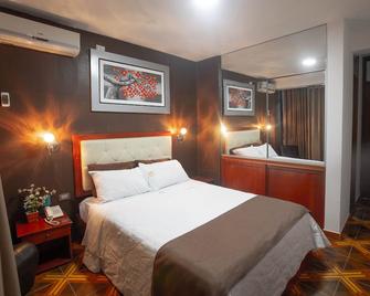D´Milez Hotel - Puerto Maldonado - Slaapkamer