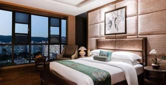 Shengshi Qianhe Hotel - كونمينغ - غرفة نوم