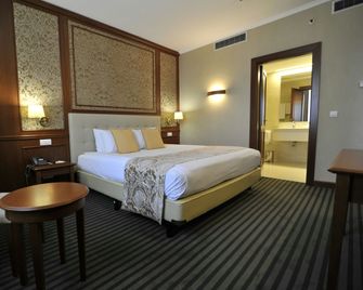 홀리데이 인 스코페 바이 IHG - 스코페 - 침실