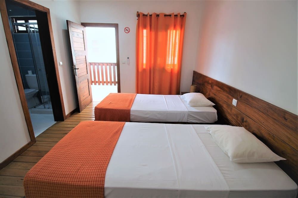 Sweet Guest House - סאו טומה - חדר שינה