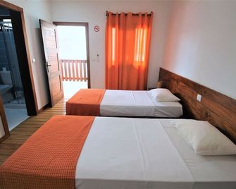 Sweet Guest House - סאו טומה - חדר שינה