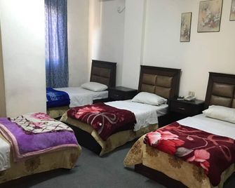 Kahramana Hotel - Amman - Schlafzimmer