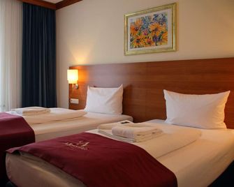 Abasto Hotel Eichenau - Fürstenfeldbruck - Schlafzimmer