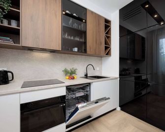 Apartment Sarmacka Wilanów with Parking, Sauna & Gym by Noclegi Renters - Varsovia - Cocina