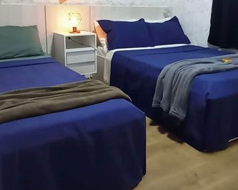 فلات آند ريزيدنس بريميوم - كامبو غراندي - غرفة نوم