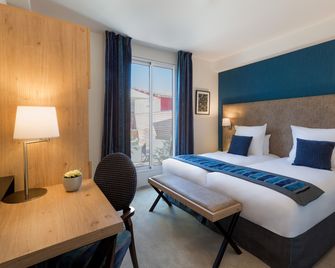Hôtel Le Rive Droite & Spa - לורד