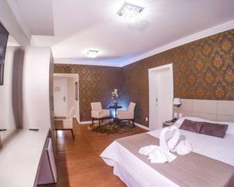 Seville Park Hotel - Xanxerê - Camera da letto