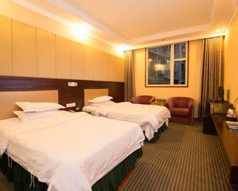Xichong Mingcheng Holiday Hotel - Nan-čchung - Ložnice