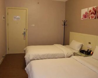 Fu Bao Boutique Hotel-shenzhen - שנג'ן - חדר שינה