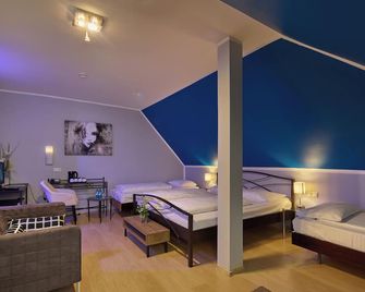 Trip Inn Posthotel Düren - Düren - Bedroom