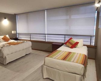 Apart Hotel Aragon Portal - Temuco - Habitación