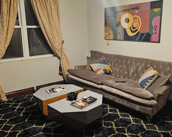 Loft 3 1-bedroom apartment in terrific Logan with Wi-Fi, AC - Logan - Huiskamer