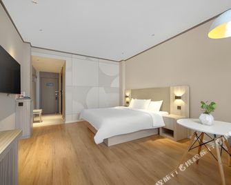 Hanting Hotel Harbin Qiulin Branch - חרבין - חדר שינה