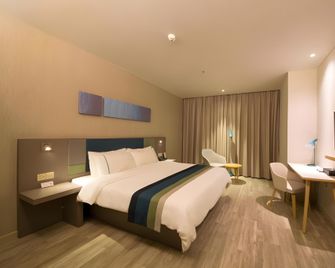 Home Inn Style Yingkou Jinniu Mountain Avenue Wanda Plaza - Yingkou - Schlafzimmer