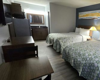 Hometowne Studios Lagrange - La Grange - Schlafzimmer