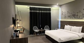 Stark Boutique Hotel and Spa - Denpasar - Kamar Tidur
