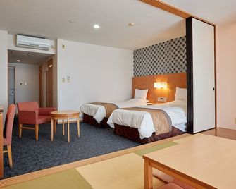 Hotel Murasakimura - Yomitan - Schlafzimmer