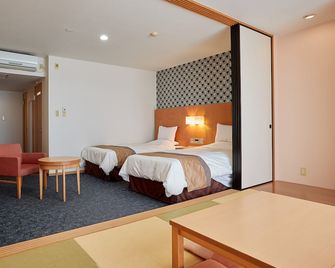 Hotel Murasakimura - Yomitan - Bedroom