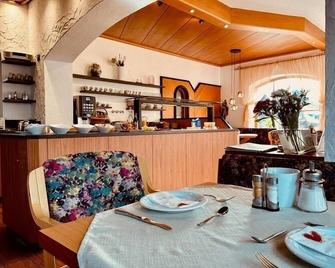 Hotel Sonnenhof - bed & breakfast & appartements - Innsbruck - Restaurante