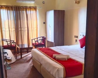 Maa Paradise World - Alīpur Duār - Bedroom