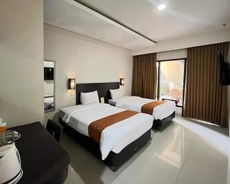 Ommaya Hotel & Resort - Surakarta - Schlafzimmer