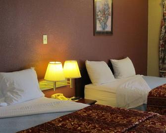 First Western Inn - Fairmont City - Fairmont City - Bedroom