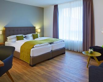 Hotel Kapellenberg - Eibelstadt - Schlafzimmer