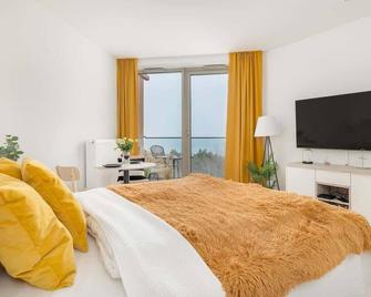 Sunny Coast Studio with SPA in Pobierowo by Noclegi Renters - Pobierowo - Schlafzimmer