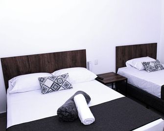 Ayenda Hotel MM - Pereira - Schlafzimmer