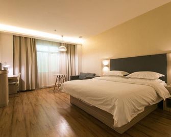 Hanting Hotel (Xining Huangguang) - Xining - Soveværelse