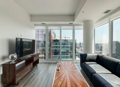 Corporate Stays | Sodo | Dazzling 1BR apt - Calgary - Living room