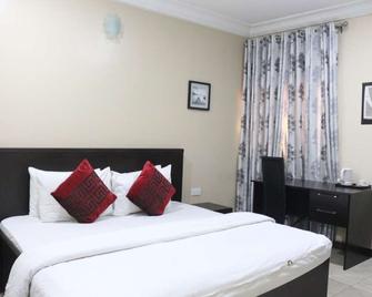 Rosmohr Hotels - Uyo - Habitación