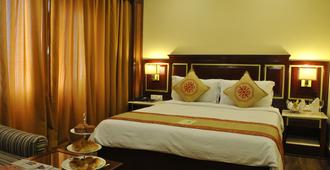 Dynasty Hotel - Guwahati - Phòng ngủ