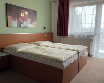 Hotel Ostrov Garni - Sadská - Camera da letto