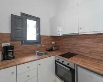 Nostos Apartments Fira - Thira - Kuchnia