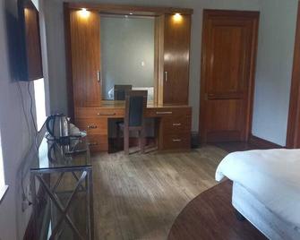 Arcadian Spa and Lodge. Serenity and tranquility in our rooms. - Midrand - Schlafzimmer