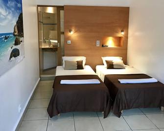 كارايبيس هوتل - لو جوسيير - غرفة نوم