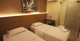Place2Stay - Airport - Kuching - Yatak Odası