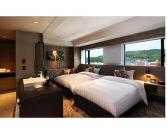S Cube Hotel by Shiroyama - Satsumasendai - Спальня