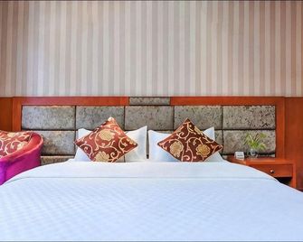 Muya Hotel (Xinshan Village Dadukou Pedestrian Street Branch) - Chongqing - Bedroom