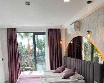Karikatuer Bi Hotel - Alanya - Bedroom