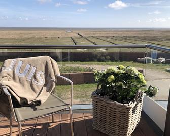 Comfort vacation apartment with south-facing balcony and unique view of the mudflats - Juist - Balkon