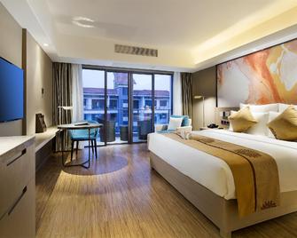 Orange Seasons International Hotel - Haikou - Habitación
