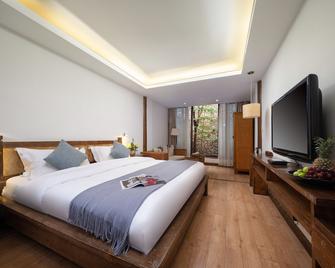 Merry Inn Lijiang - Lijiang - Yatak Odası