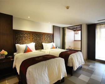 Nanjing Baliyuanshu Vogue Hotspring Hotel - Zhenjiang - Bedroom
