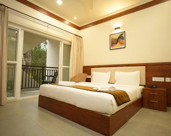 Royalton Residency - Kottayam - Schlafzimmer
