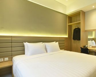Grass Inn Hotel Solo - Grogol - Habitación