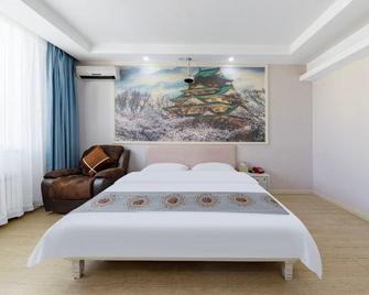 Zhenyu Hotel - Bayan Nur - Habitación