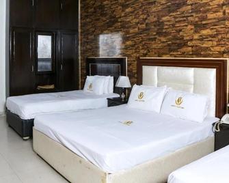 Hotel Tulip Inn - Lahore - Bedroom